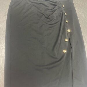 Elegant Black Skirt with Gold Button Accents . New with tag black skirt .
